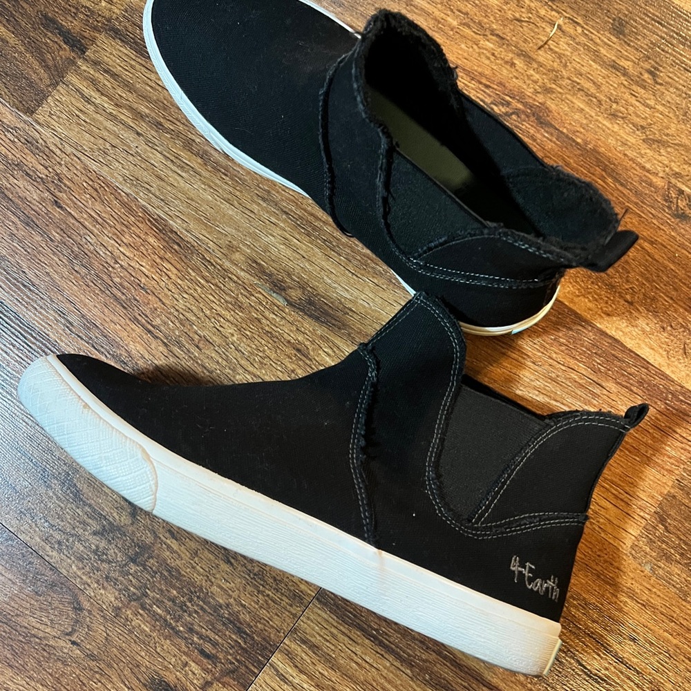 Black High-Top Sneakers with White Soles